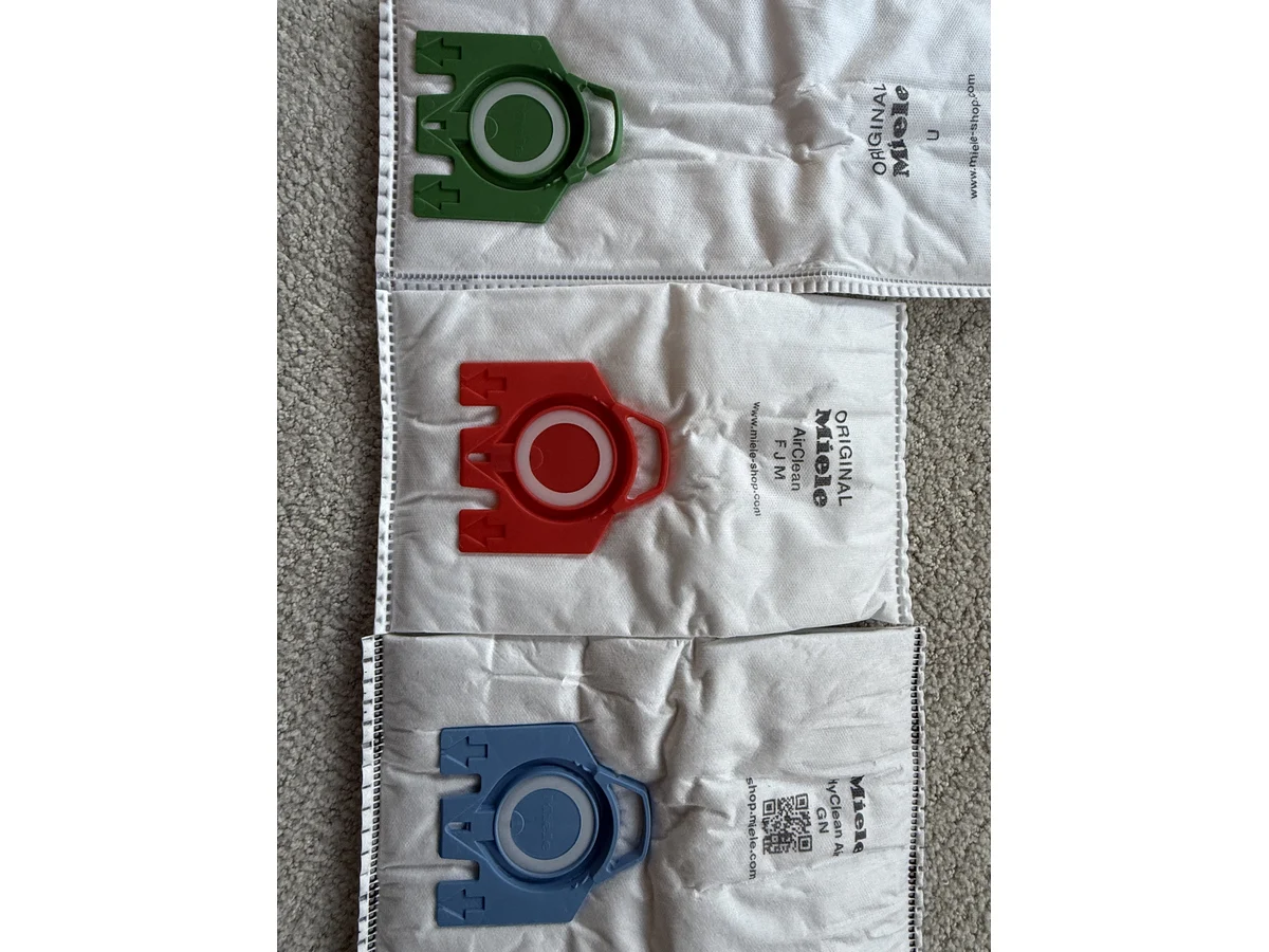 Miele Type U green collar compared with Miele FJM red collar and Miele GN blue collar